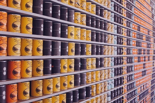 Canned foods on a supermarket shelf