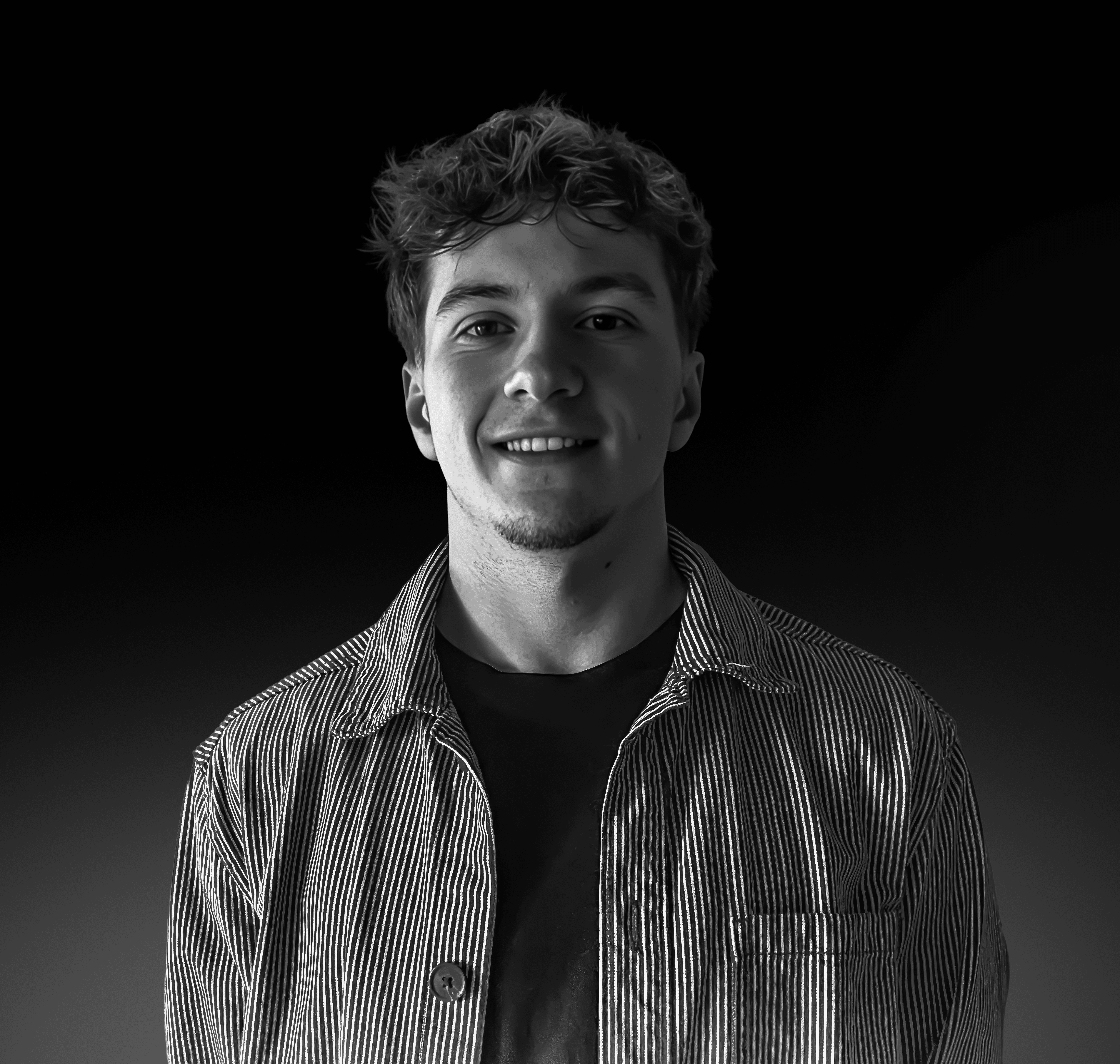 a blurry photo of a person standing in front of a wall