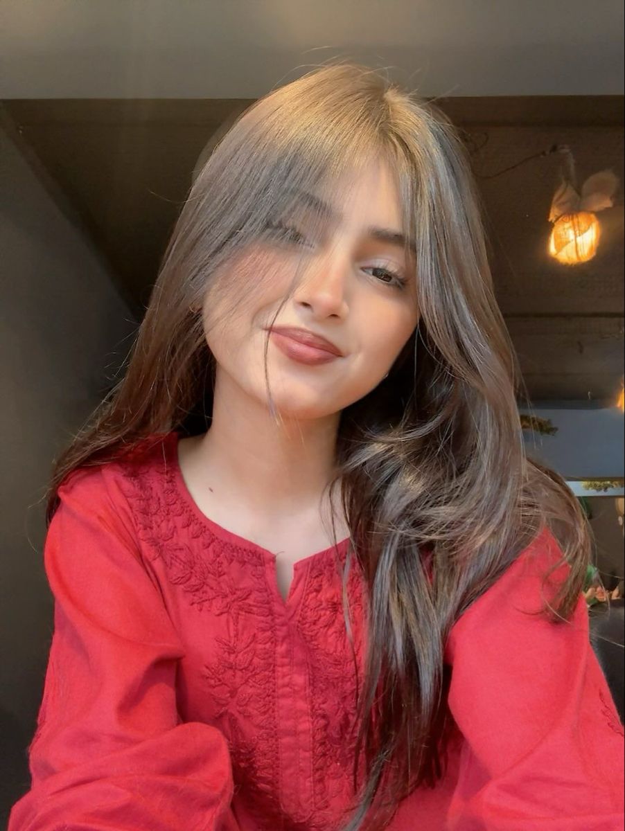 kids lying on a glass land and smiling