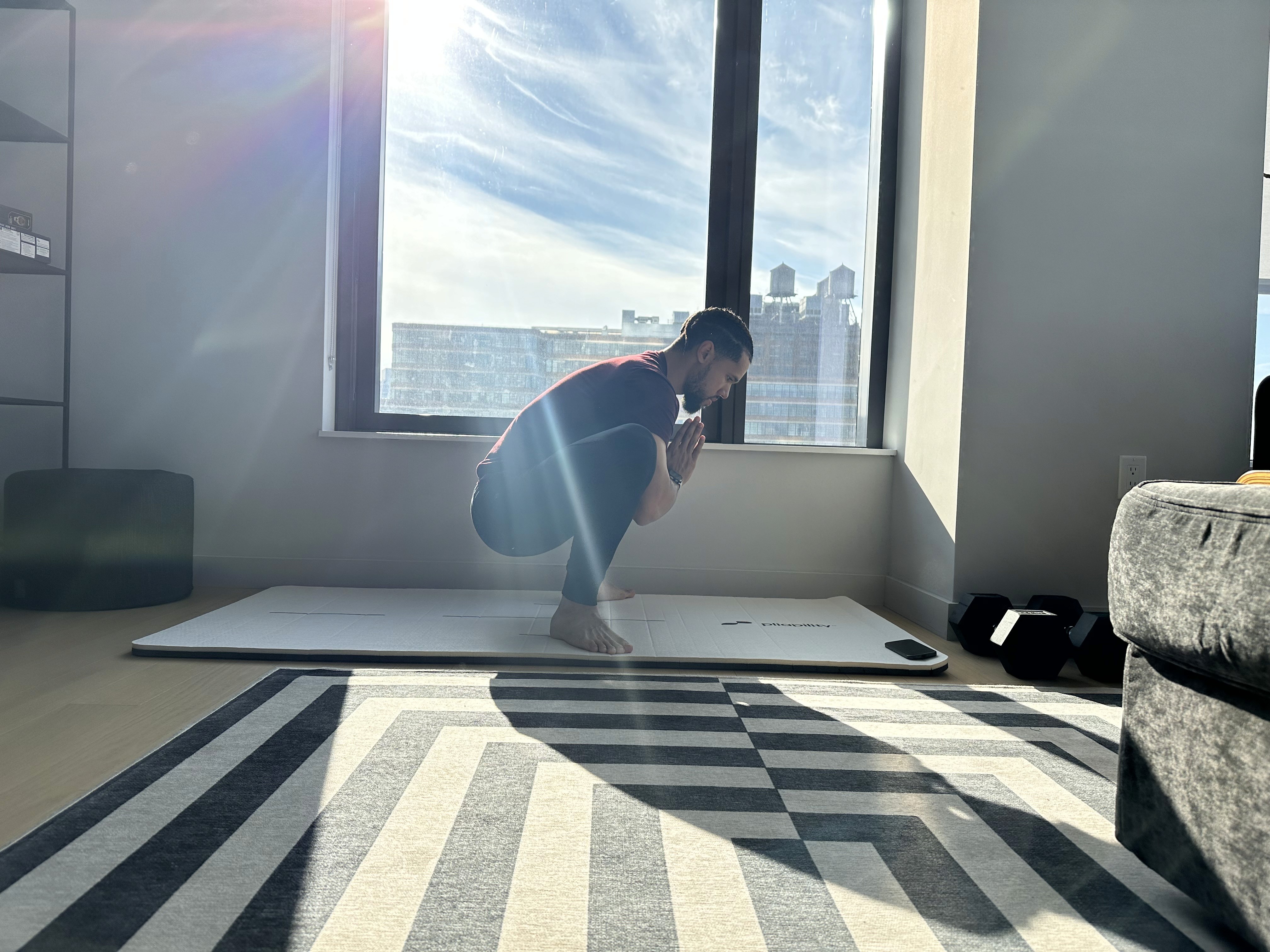 man in yoga position - Pliability vs Flexibility