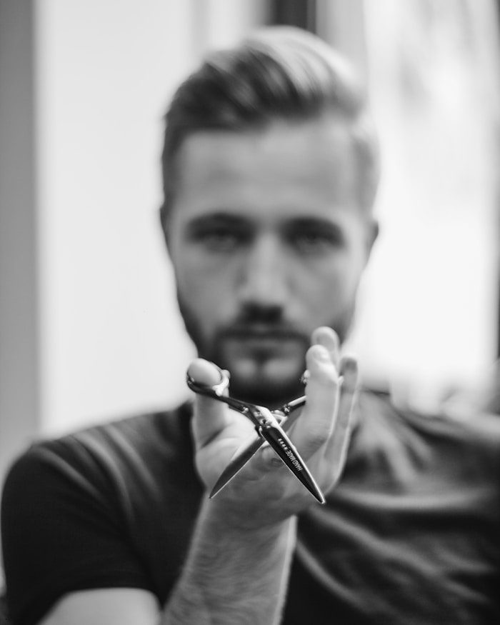 Alex Mercer, senior barber