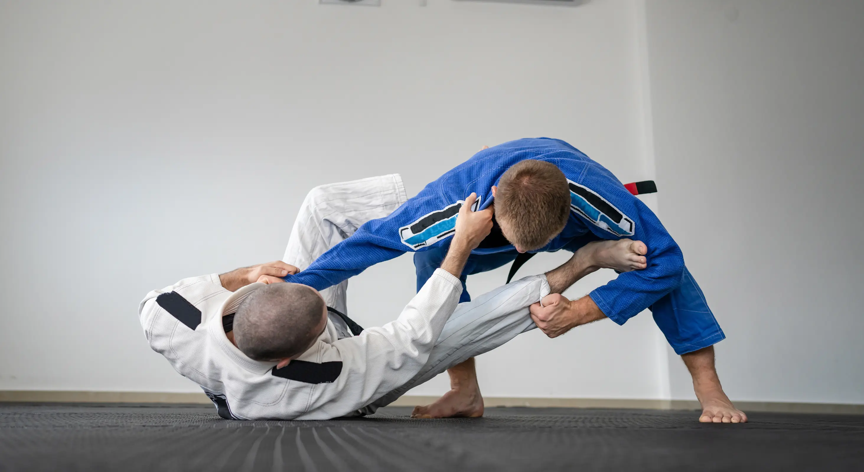 Brazilian Jiu Jitsu training focused on balance, control, and technique on the mats