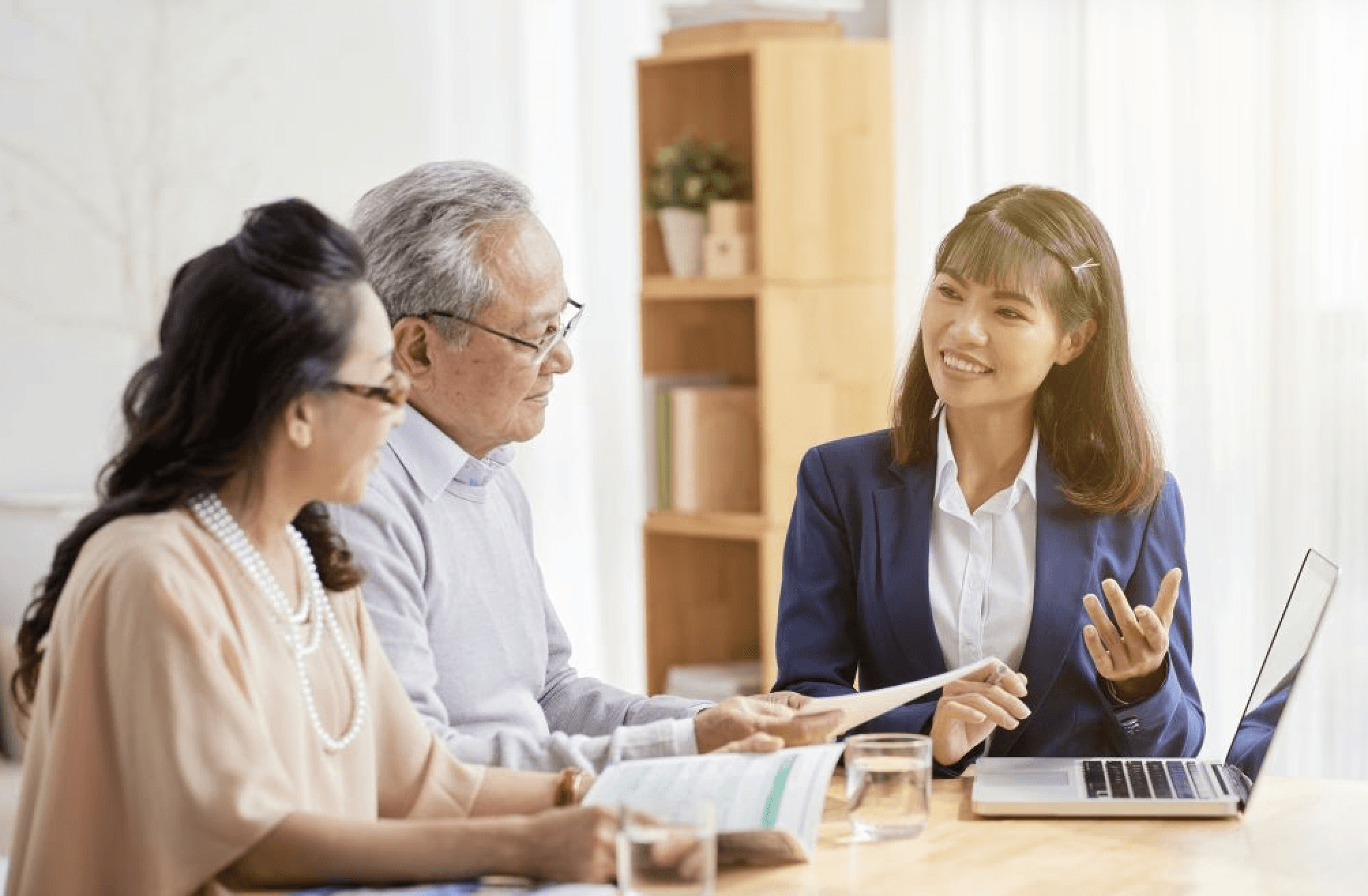 Elderly couple working with lawyer