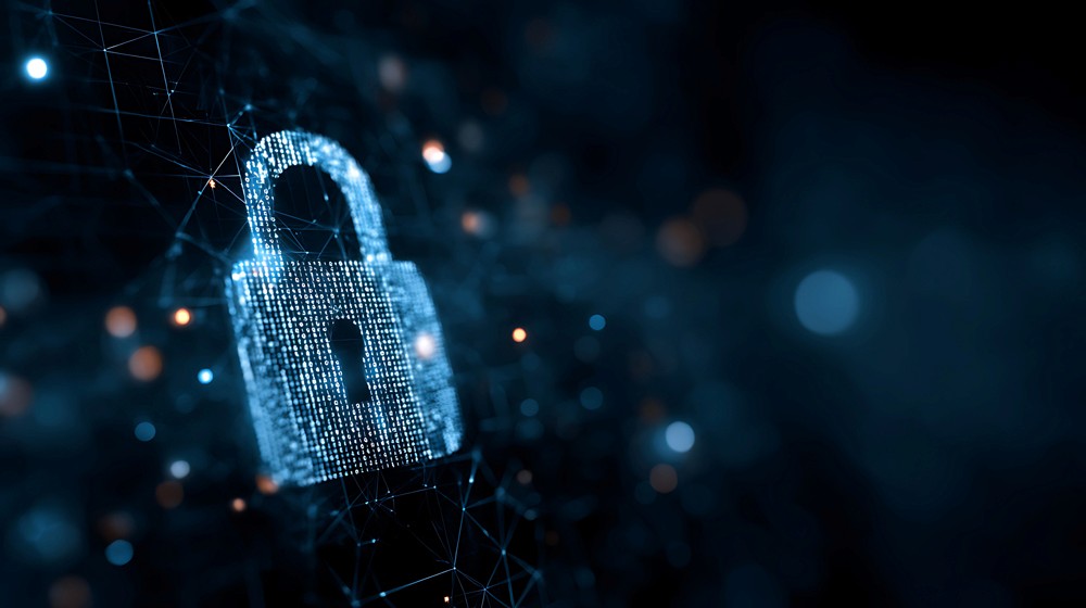 Red digital warning symbol glowing on a circuit board interface, representing active ransomware exploitation of the VMware ESXi CVE 2025 22225 vulnerability and hypervisor compromise.