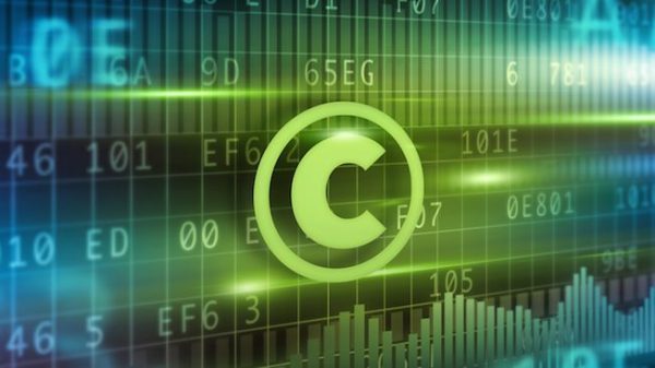 Copyright symbol on a background of charts and numbers