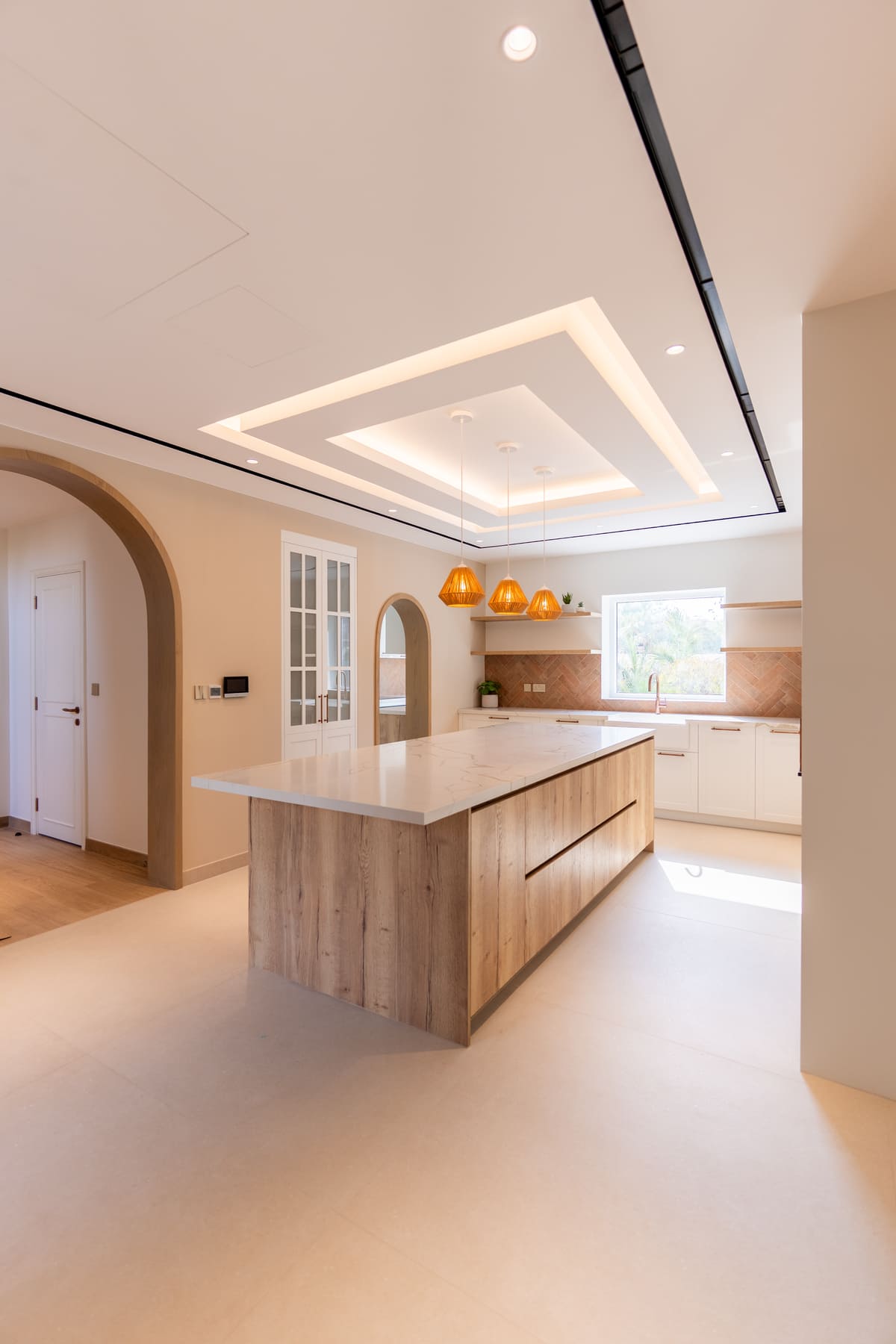 Picture of a kitchen with a glass window 