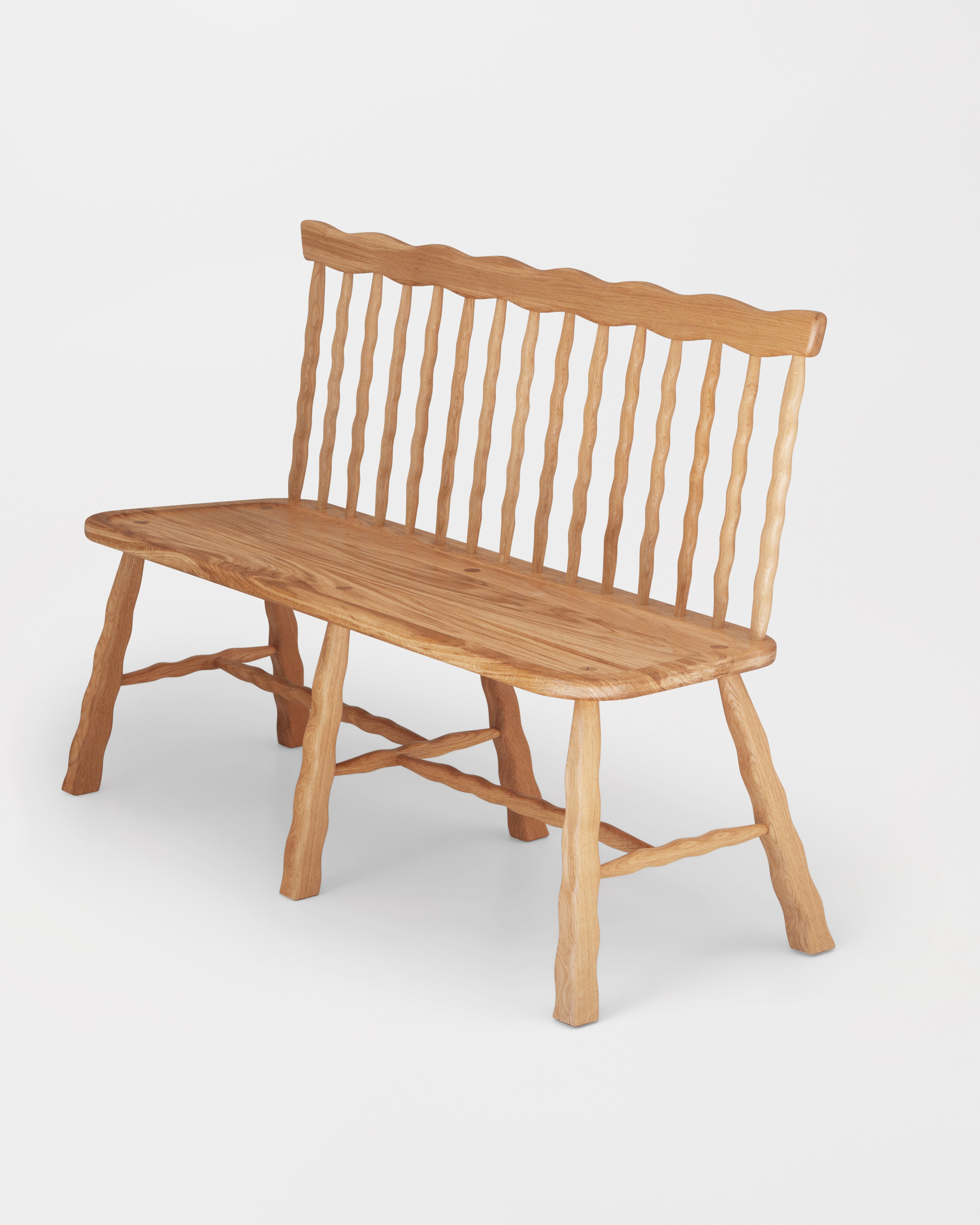 Windsor Bench in Oak on a white background
