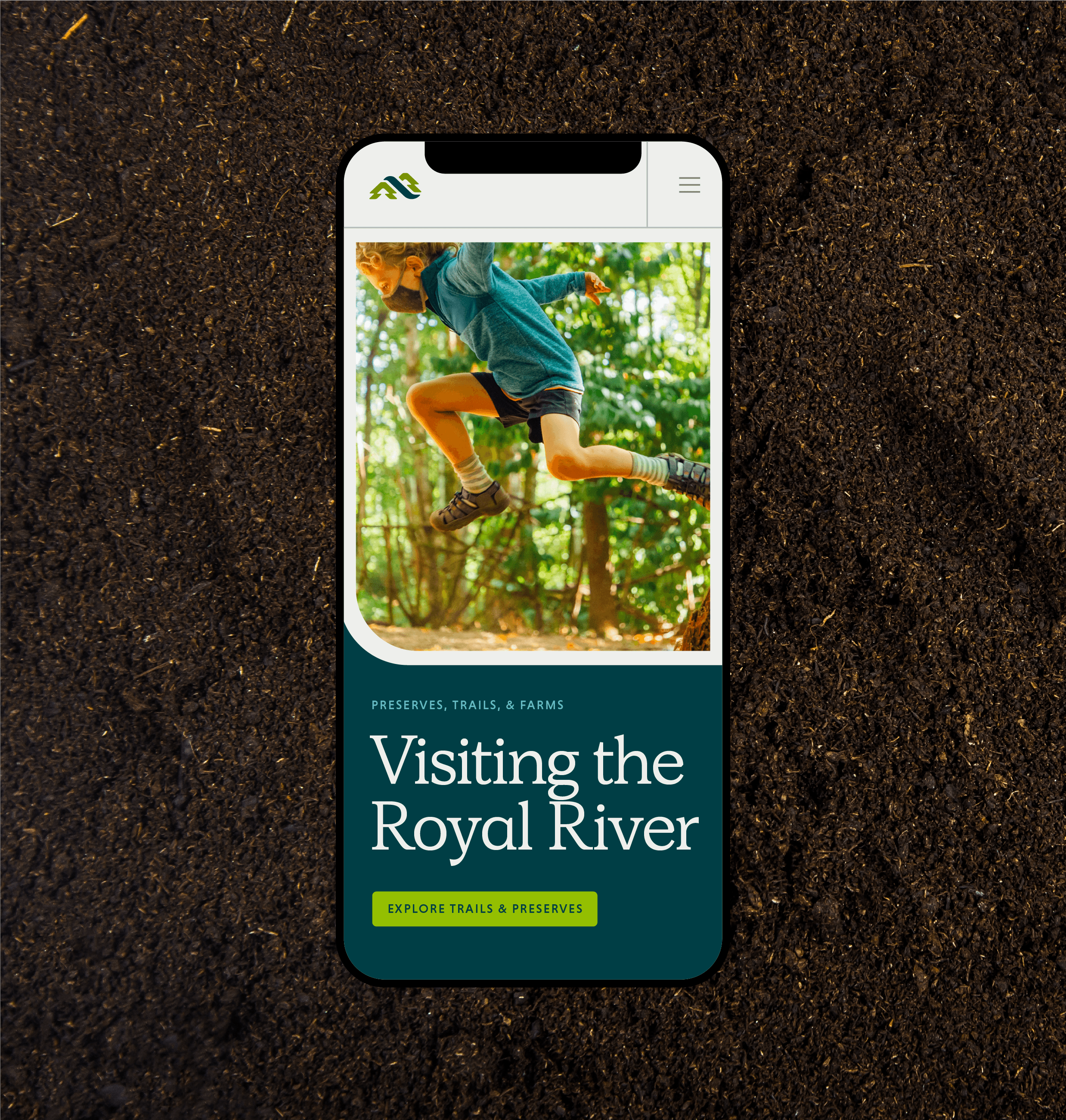 Royal River Conservation Trust mobile website displayed on smartphone featuring trails and preserves content