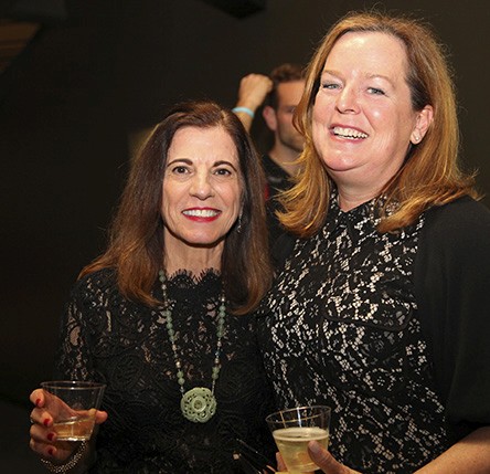 portrait of two women dressed in black