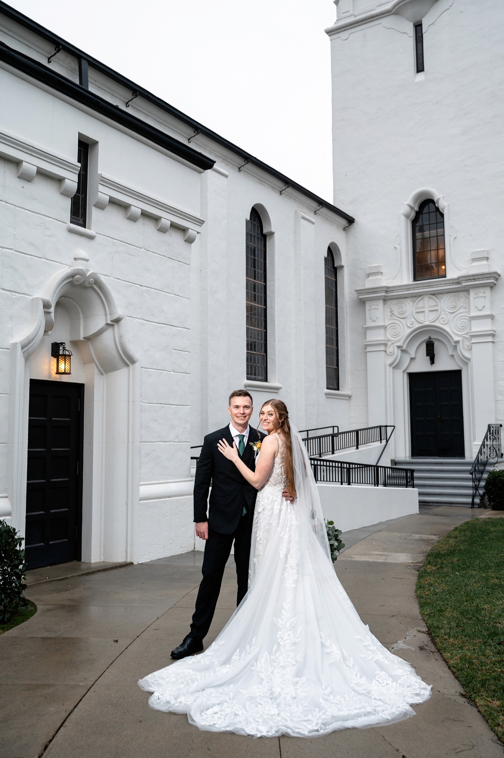Flat lay wedding details with bouquet, rings, and sparkling bridal heels