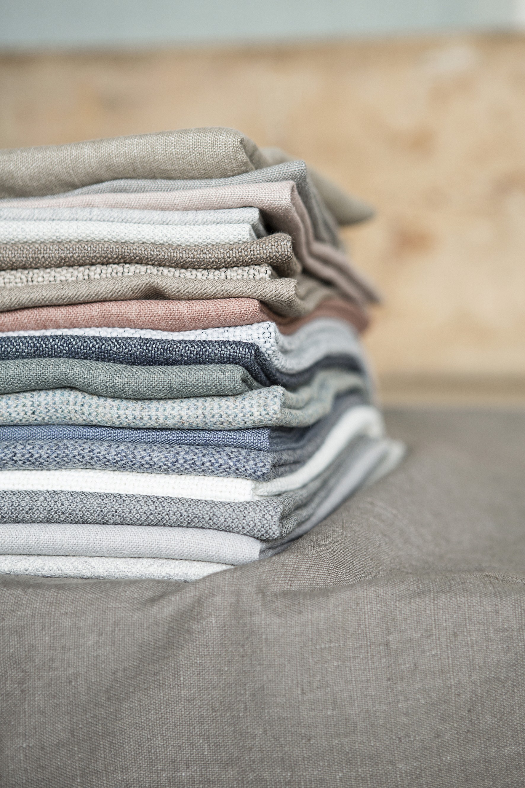 A scene of two ladies unfolding a floor mat