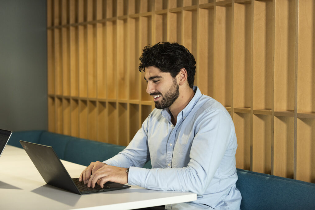 A group of people having a meeting at the office