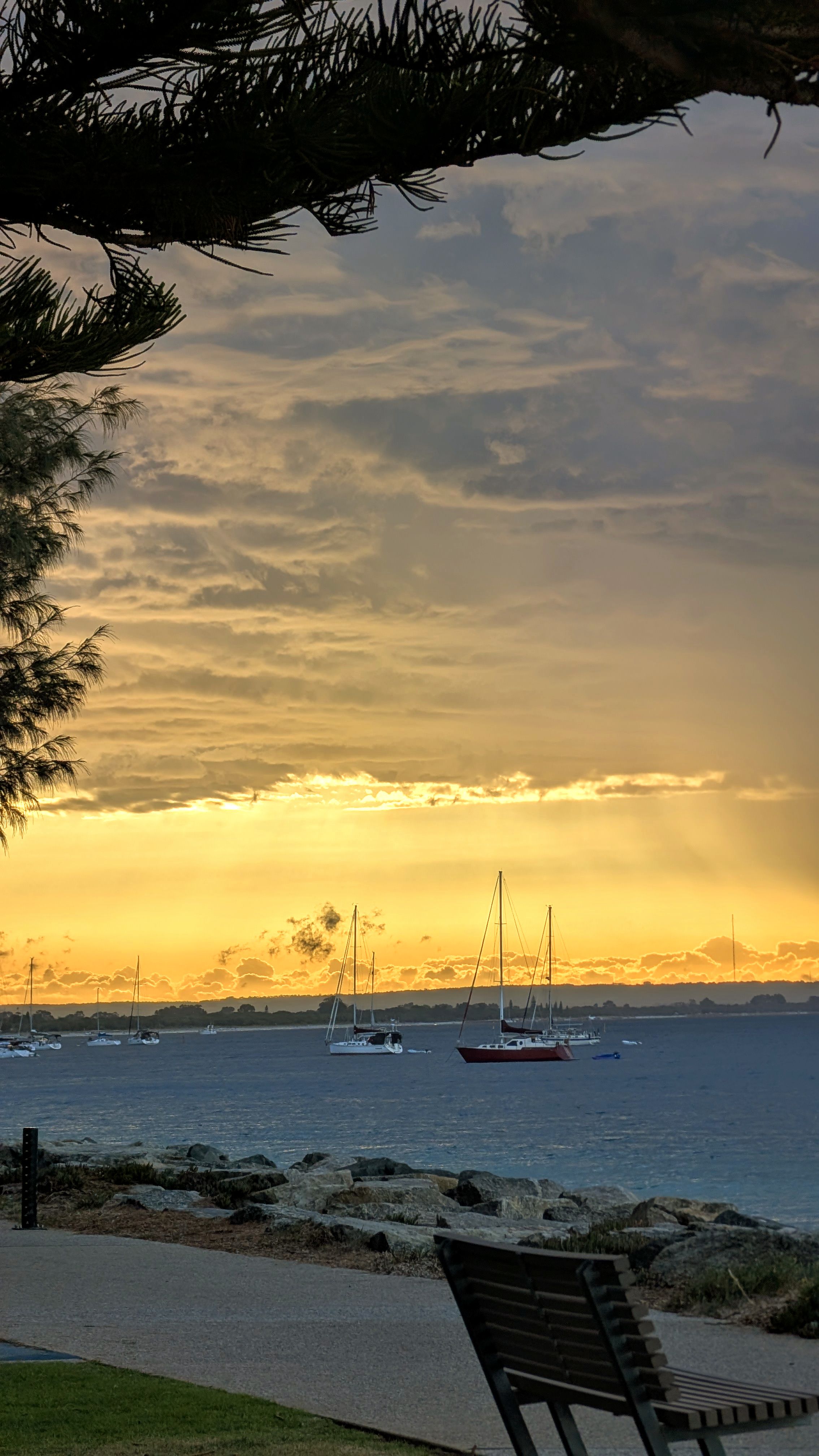 a group of people walking on a sidewalk