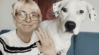 gif of Erica and her dog Ruf on the couch 
