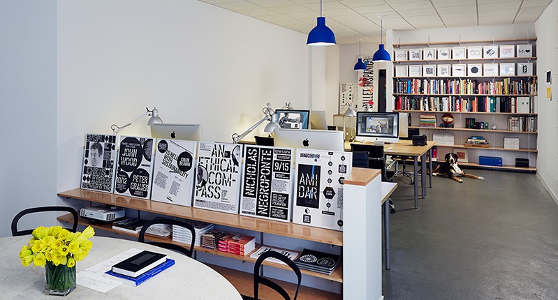A photo showing an art workshop where posters are being created.