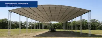 Tinglado metálico para maquinaria agrícola con estructura de acero y cubierta de chapa instalado en Tucumán.