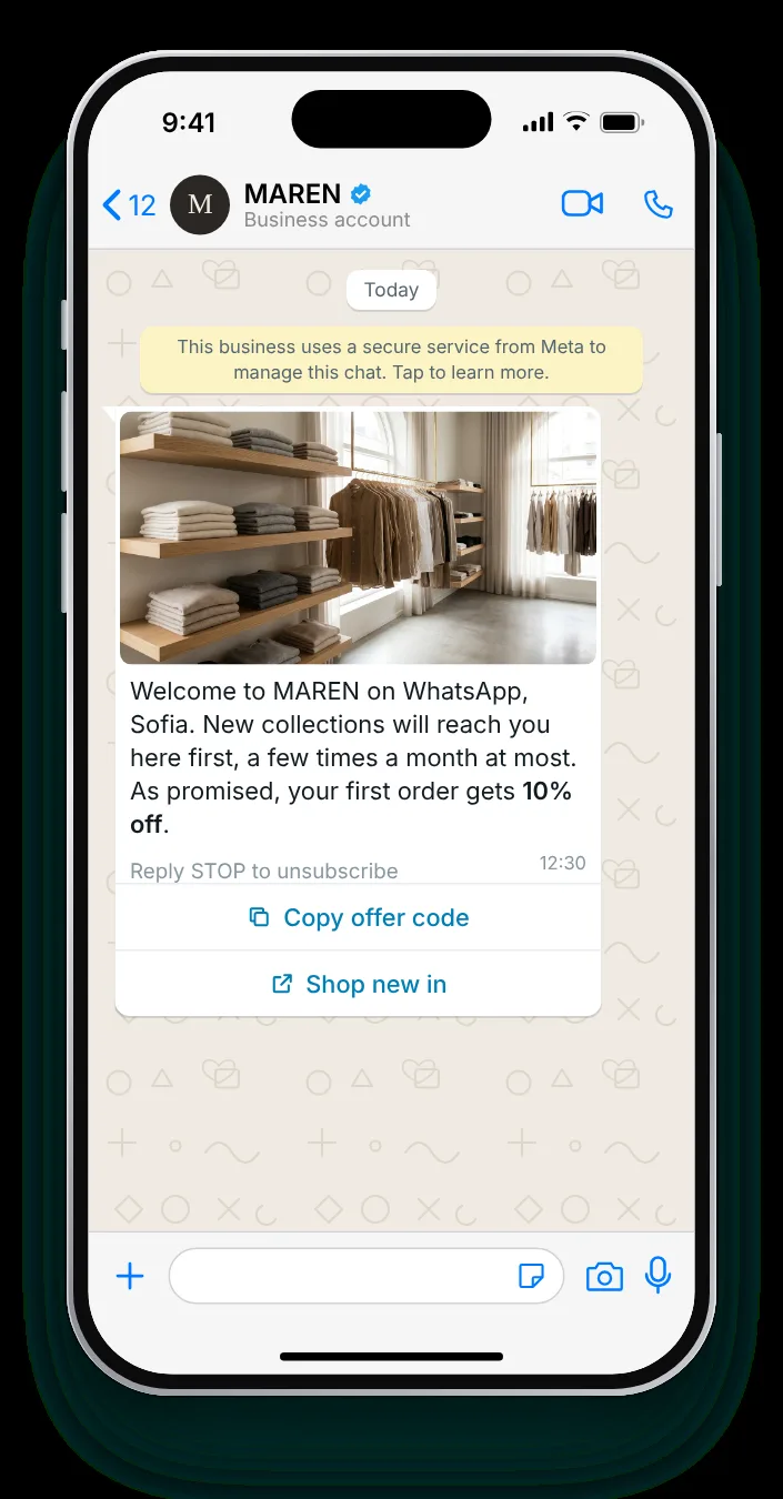 A welcome template after a website sign-up: WhatsApp greeting message on an iPhone
