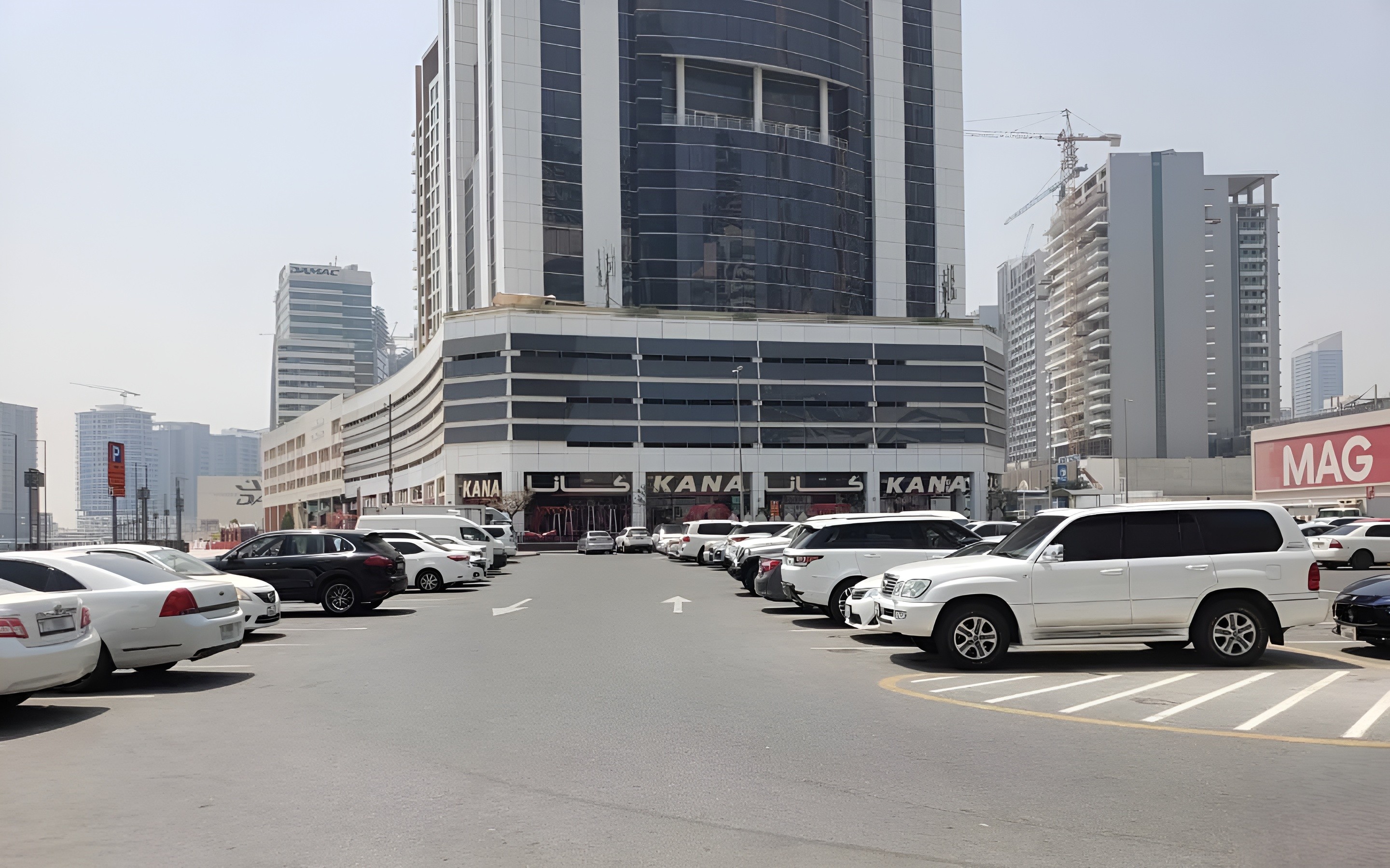 Road view of Fifty One Tower with large ground retail signage. Contact our real estate agent for viewings.