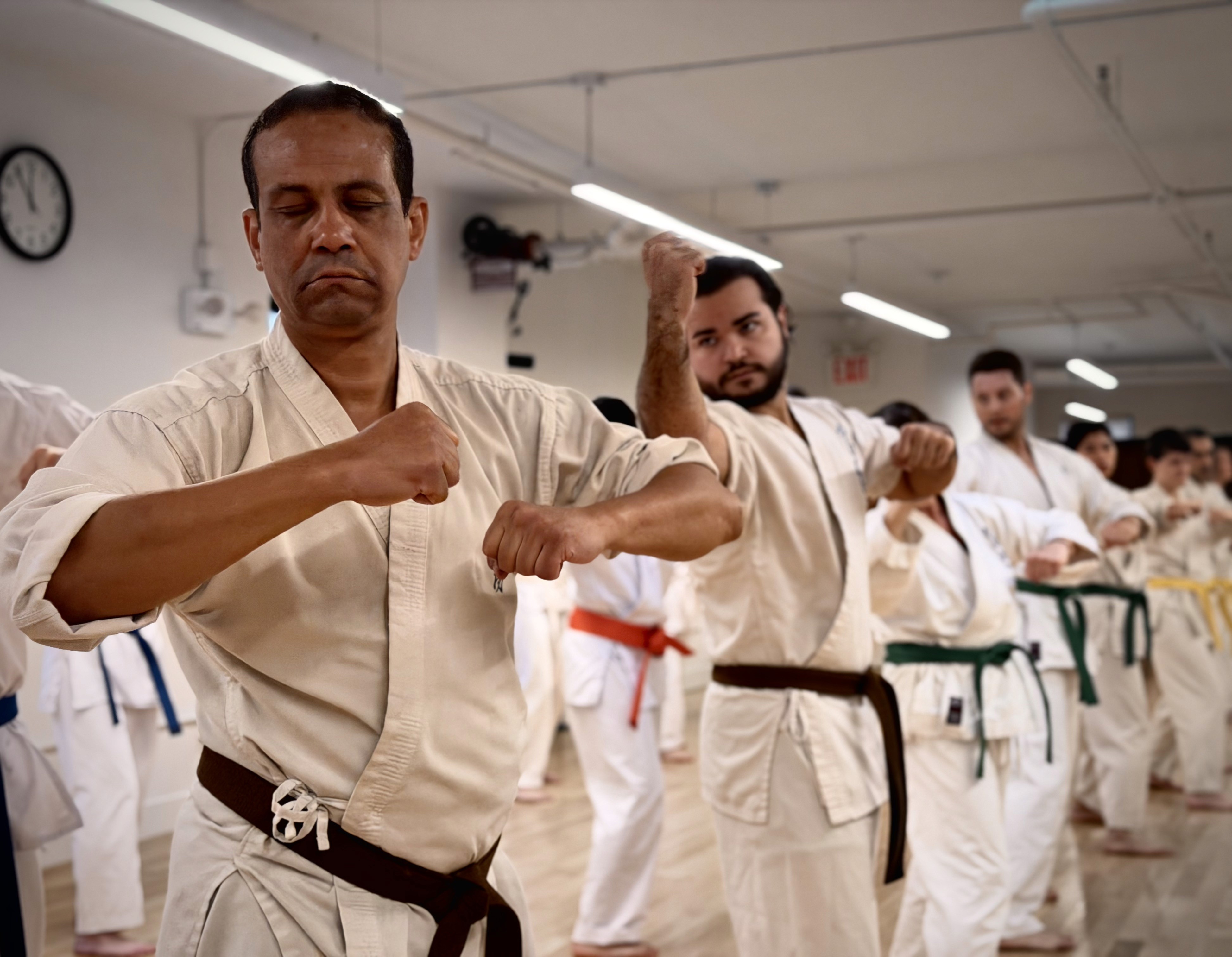 a black and white living room with a large tv