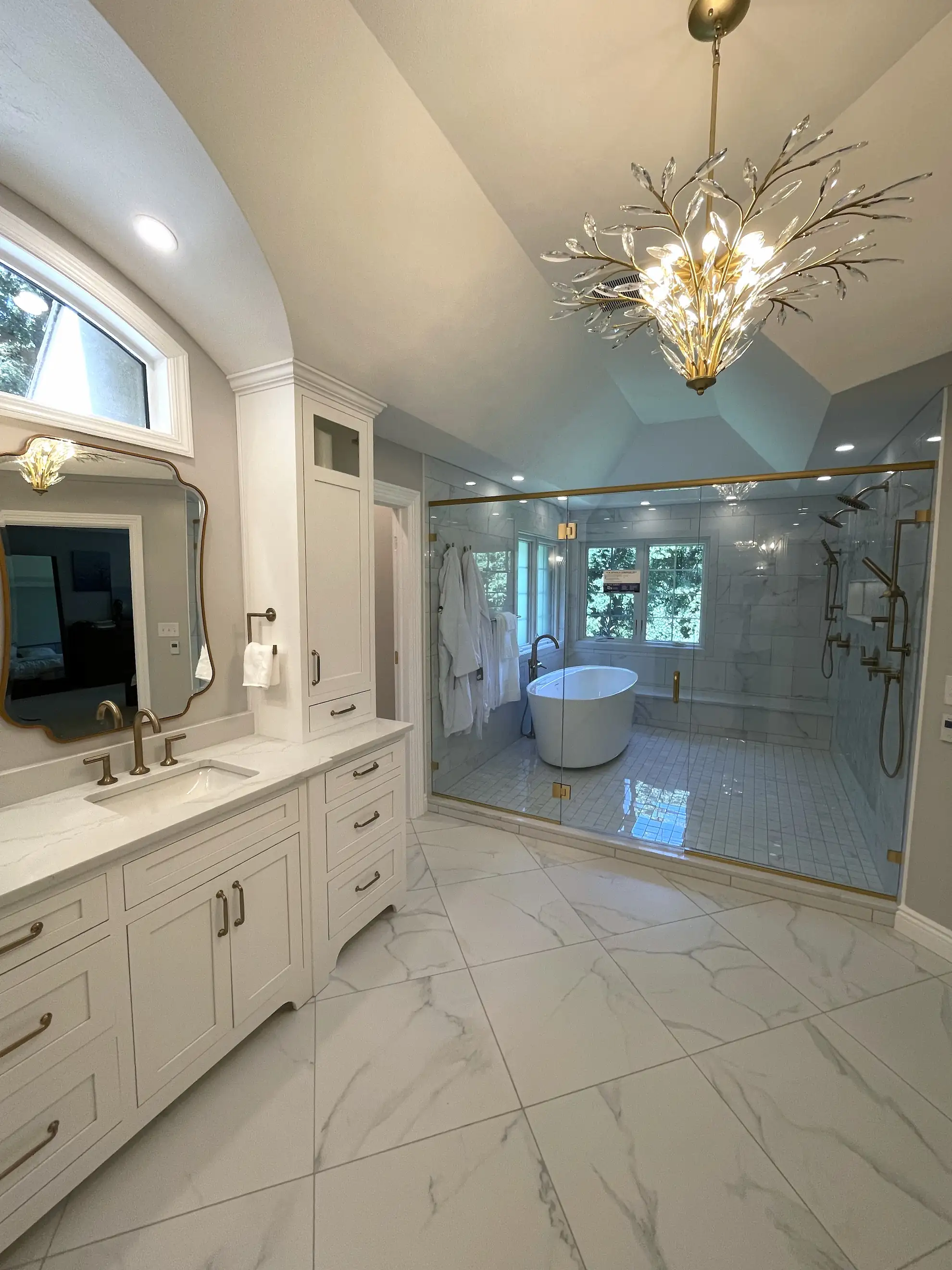 Minimalist luxury bathroom renovation in Zelienople, PA — wood vanity with quartz counters