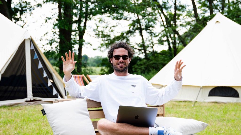 Yulife wellness tent offering meditation and relaxation sessions