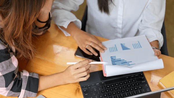 High school student conducting original marketing research with a PhD mentor in a university setting