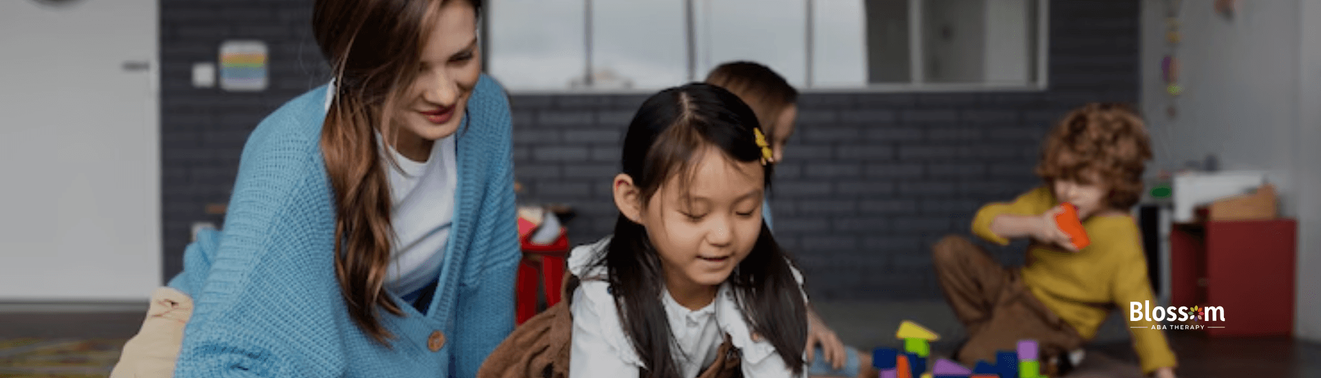 An RBT playing with kids during ABA therapy