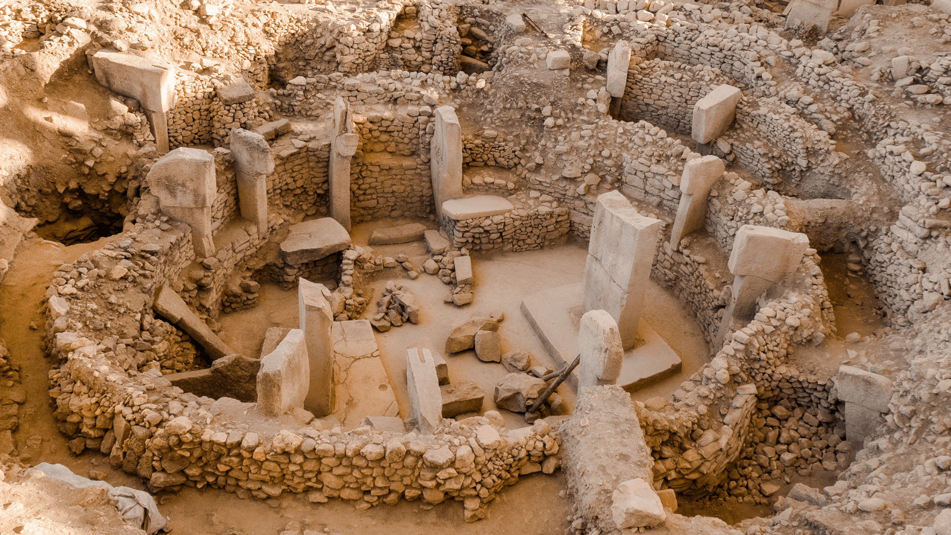 Göbeklitepe, the world’s oldest known temple in Şanlıurfa, Türkiye, with massive T-shaped pillars carved with prehistoric animal figures.