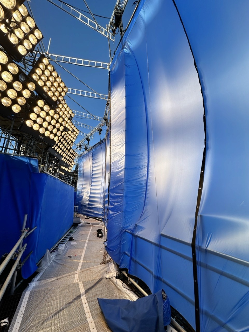 image of Film Drapes & Waterproof Blacks for Production from above being lifted by a crane on a tv set
