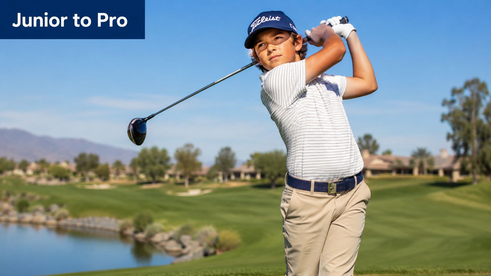 A young junior golfer wearing a cap and polo shirt swings his driver on a sunny course.