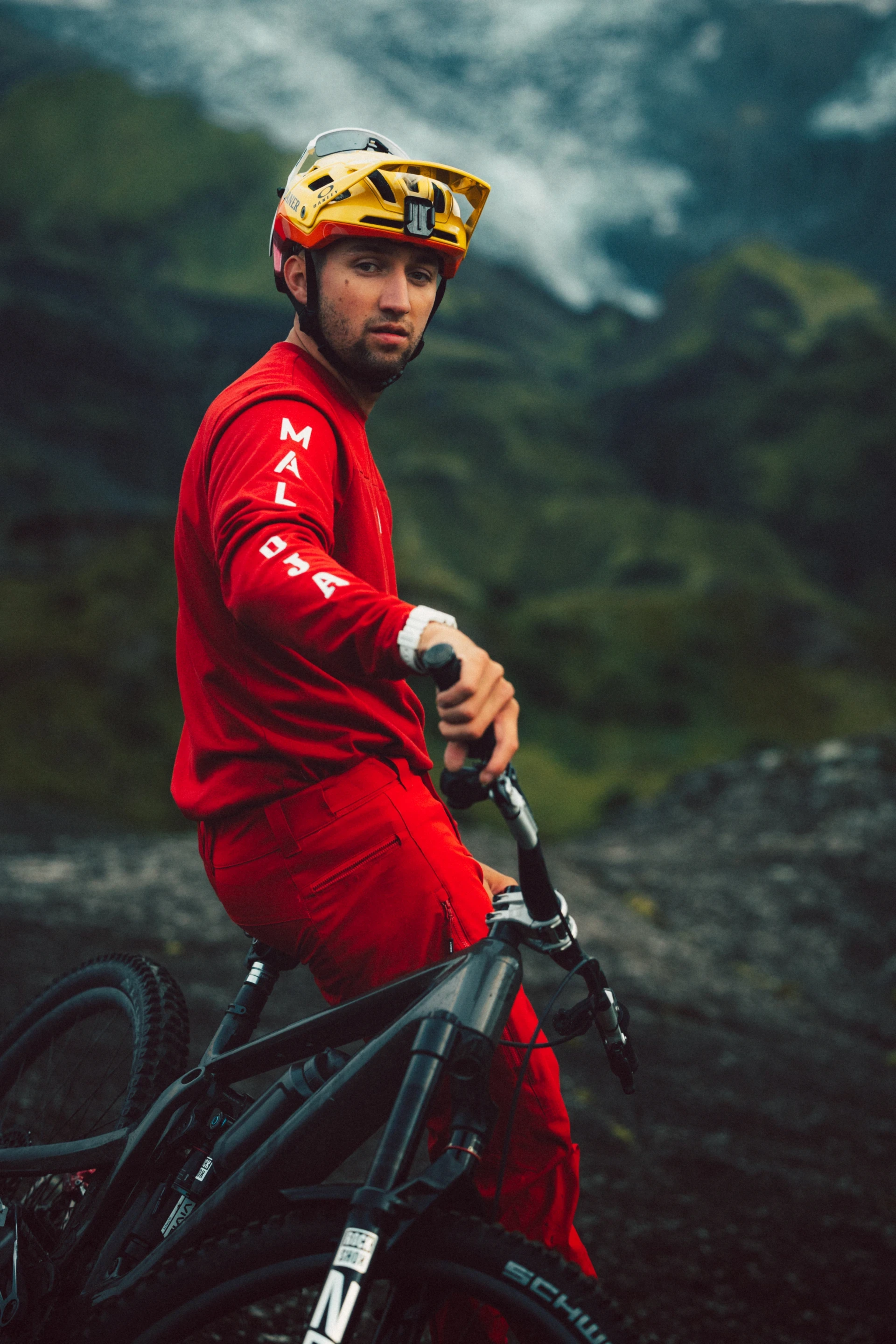 Korbi Engstler dressed in red Why Not Iceland media shoot