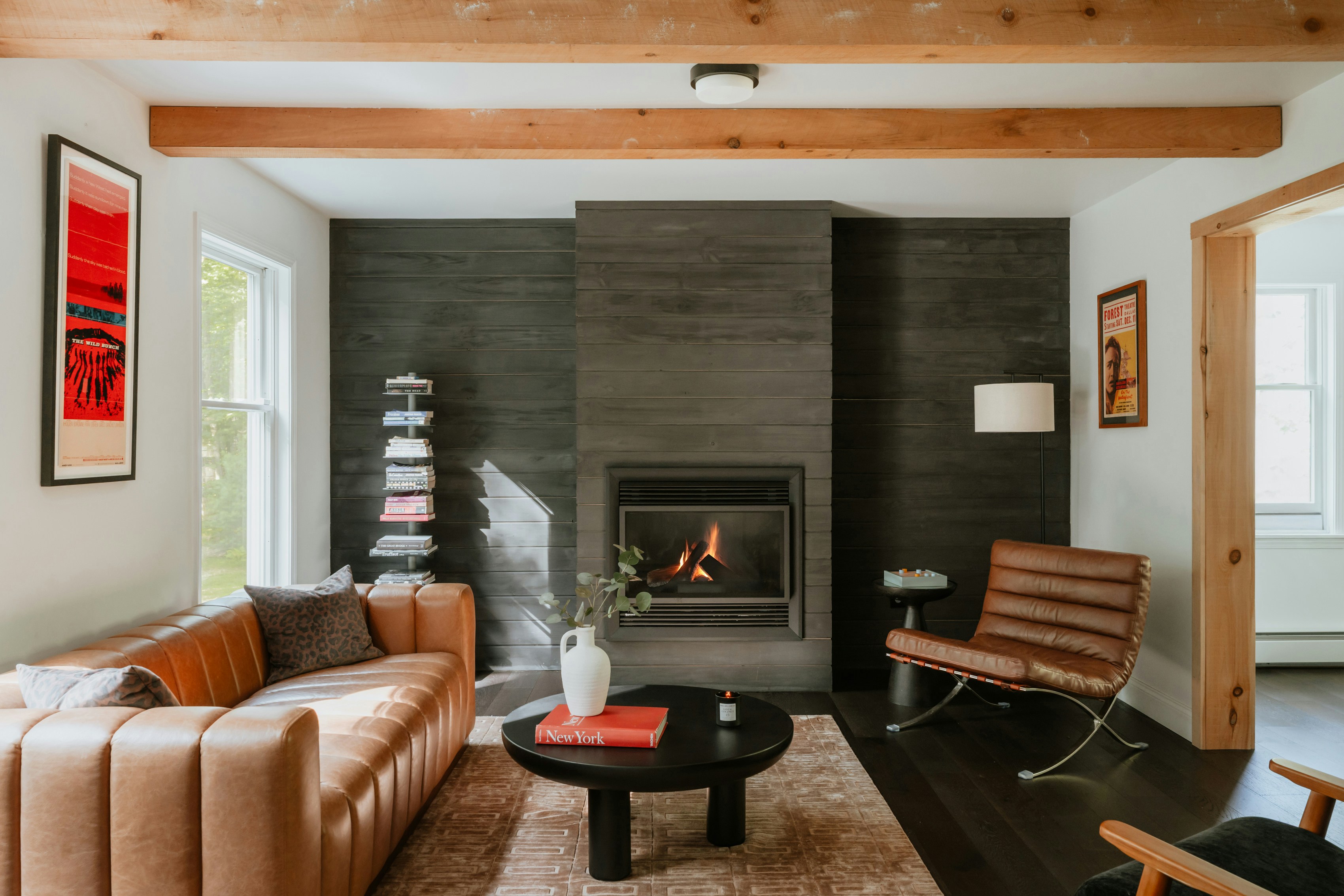 Modern living room with leather sofa and fireplace