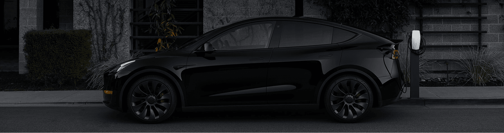 a car with its door open on a city street