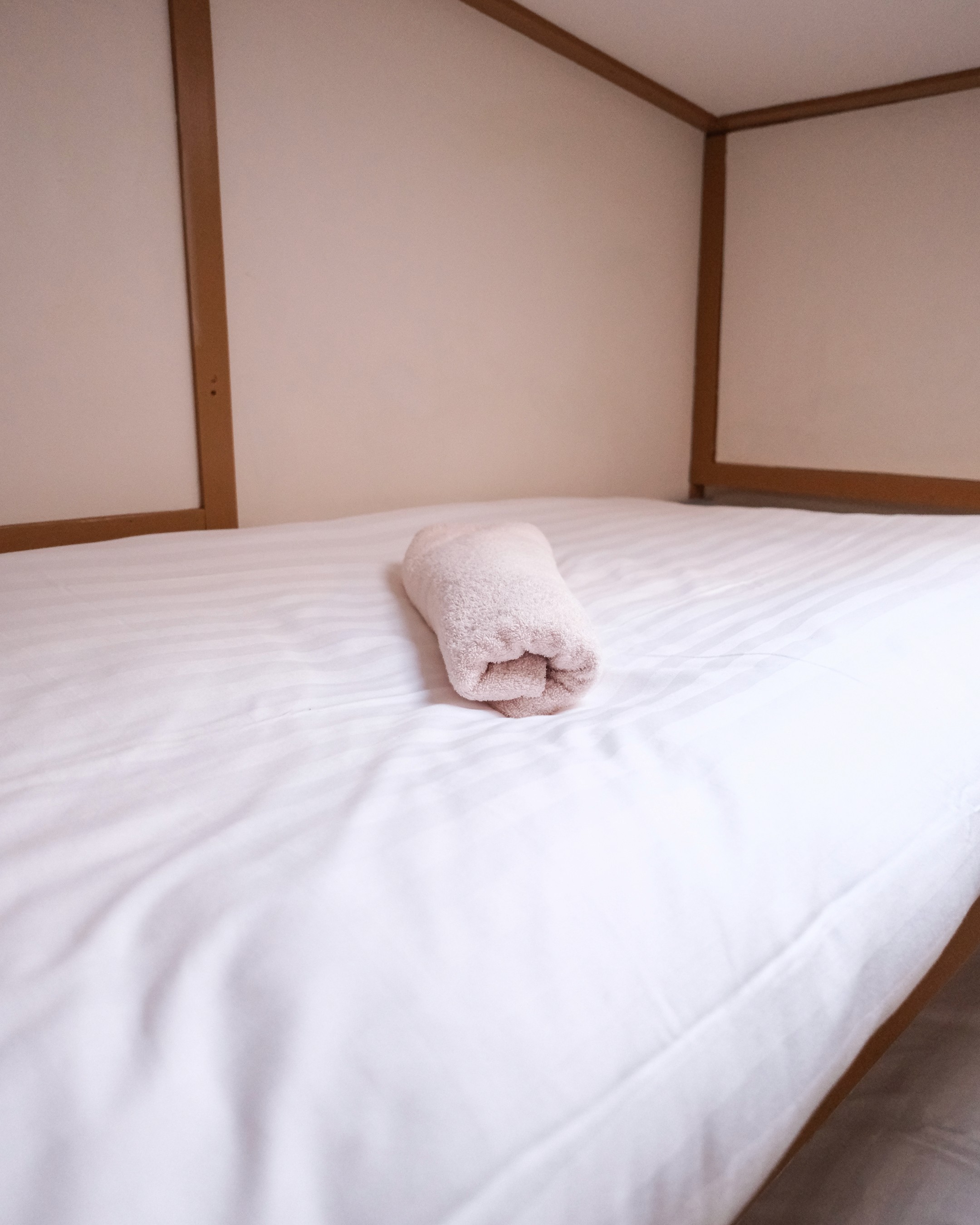 Modern office desk with angular design and leather chair