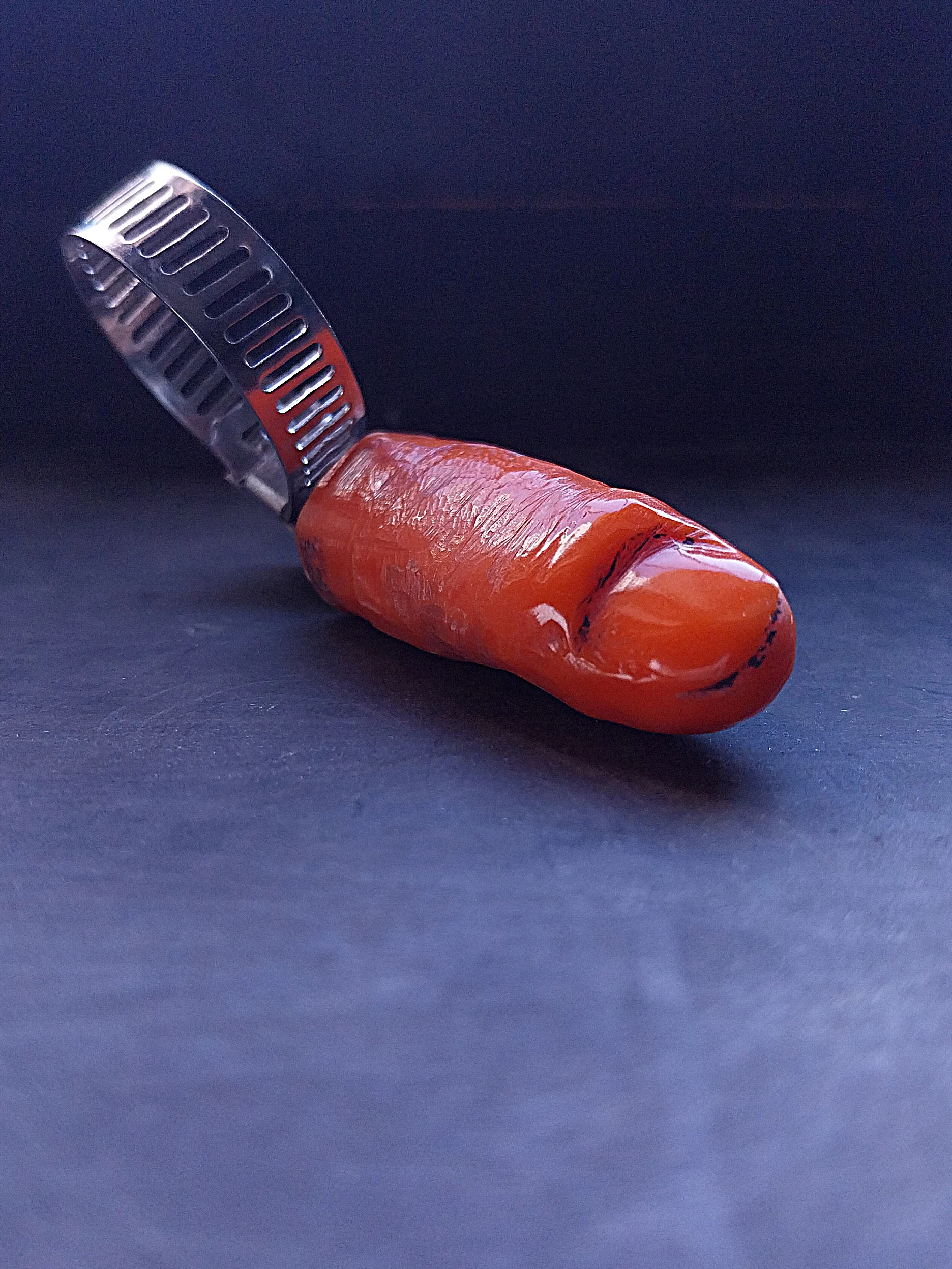 navigation AK contemporary jewelry pendant orange compozite stone carved