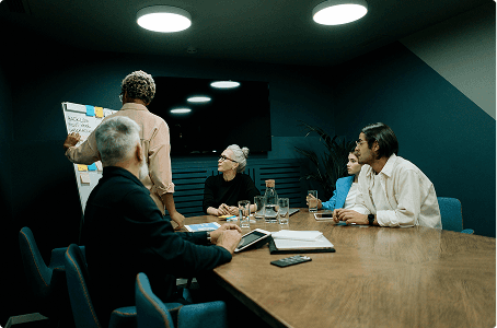 A smart dressed woman standing in an office