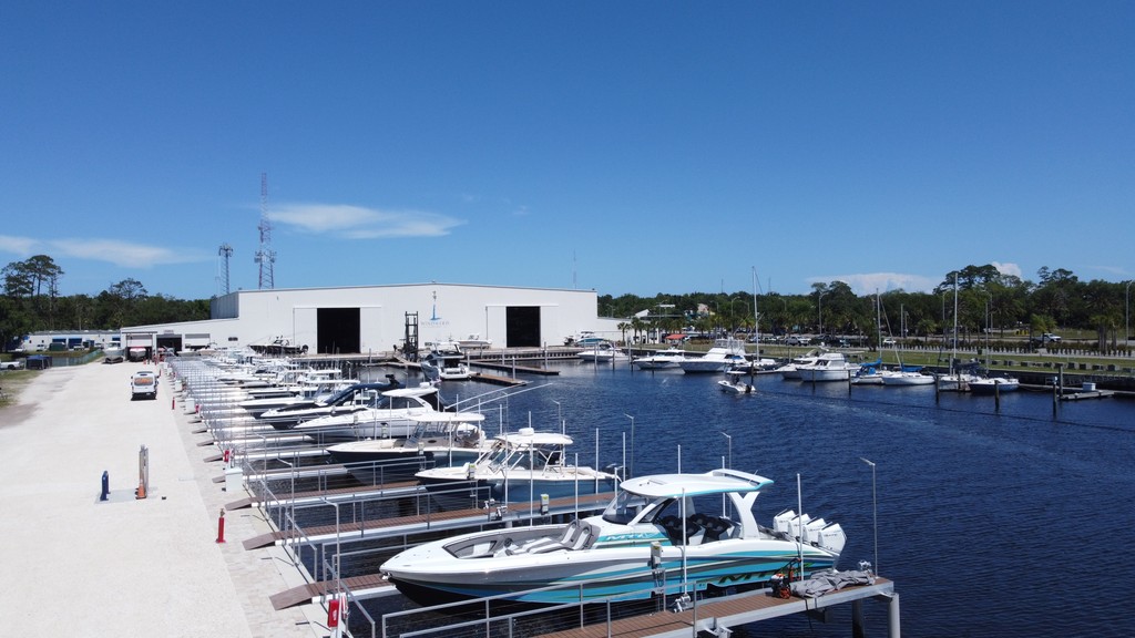 boats lined up at modern docks Windward Beach Marine