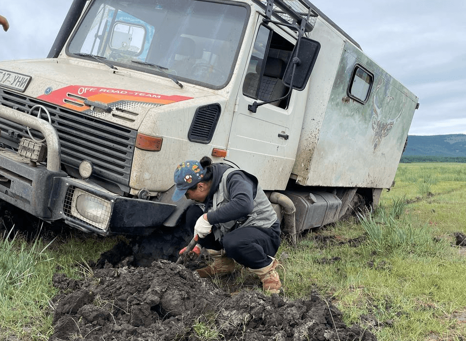 Off-road truck in Mongolia with tour guide