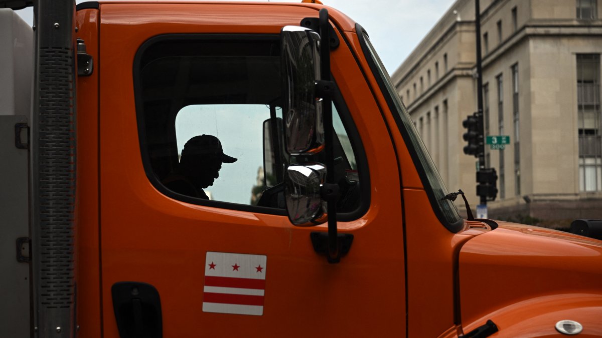 A truck driver, parked on a Washington DC street.AFP
