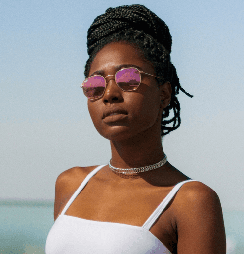 Editorial fashion photography of a woman model wearing a white swimsuit with pink glasses for Be My Guest brand