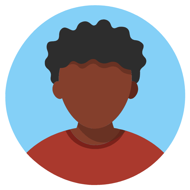 a young man wearing glasses standing in front of a mountain