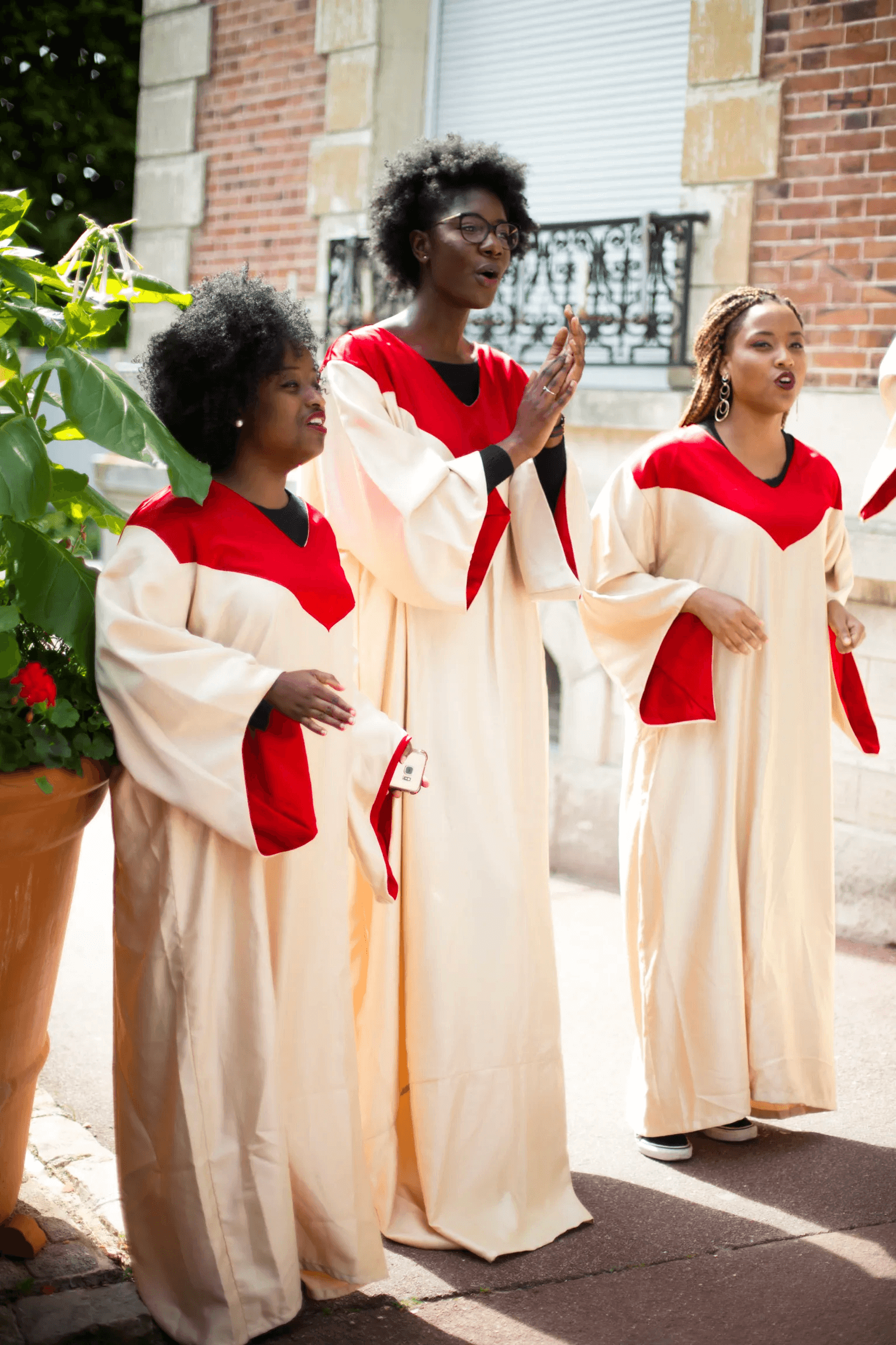man in blue suit kissing woman in white wedding dress