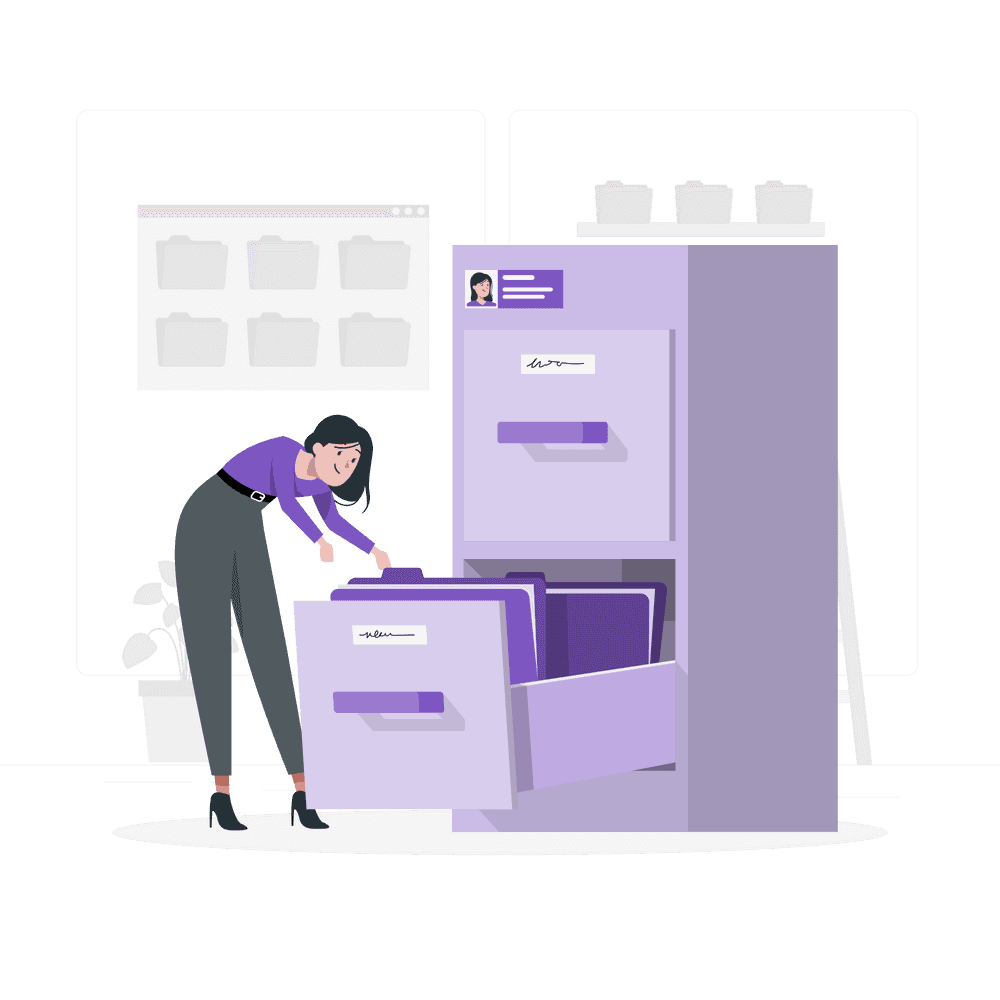 A woman sorting documents in a filing cabinet.