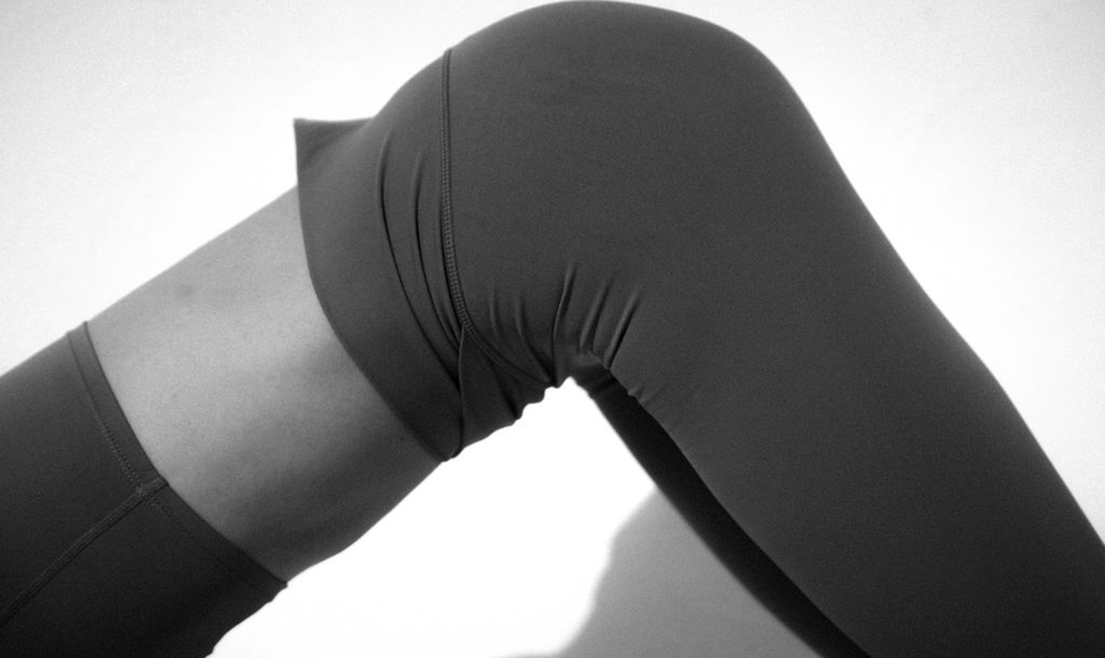 Close-up of a woman's body in movement, illustrating how body awareness and nervous system regulation support desire