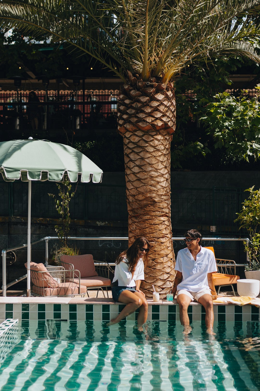 Couple sitting in the Beach Club at Afloat