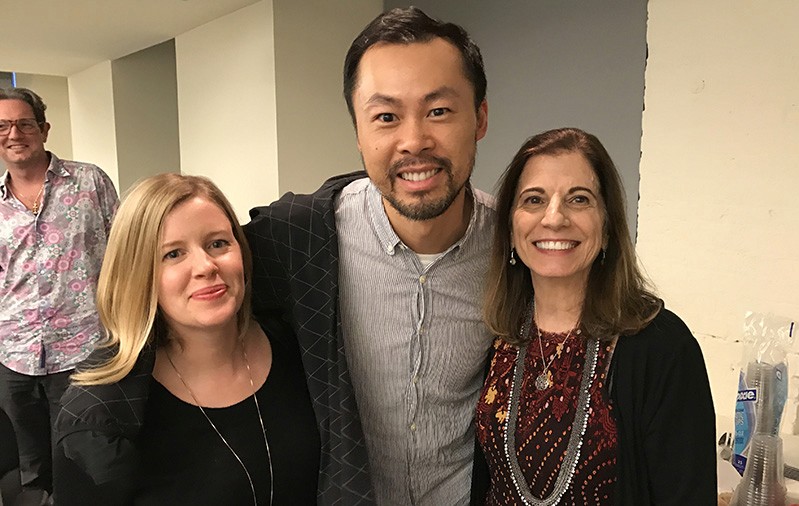 photo of a man and two women