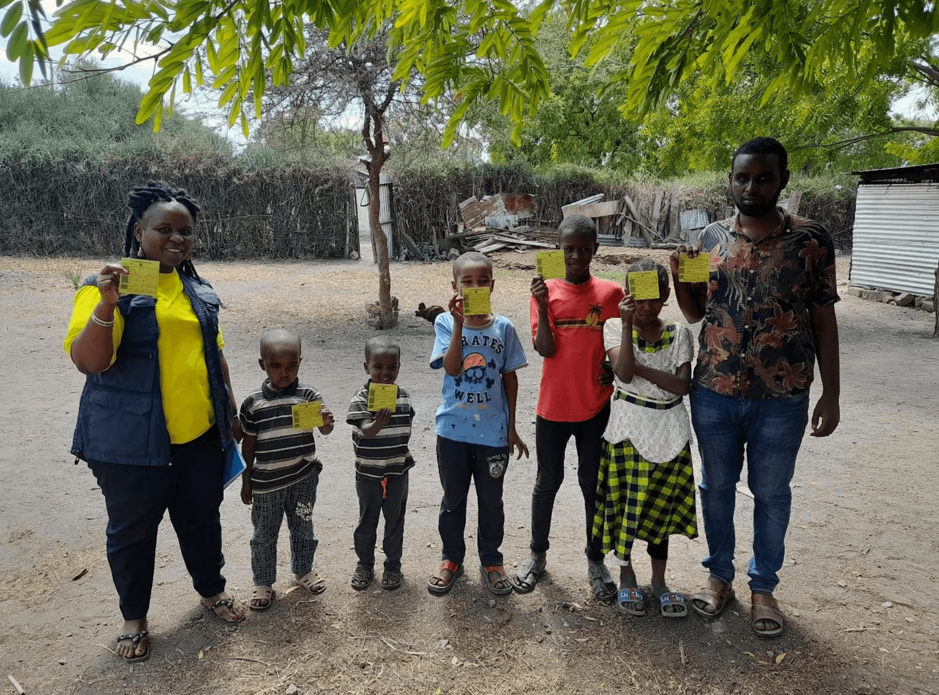 woman in gray hijab and gray coat