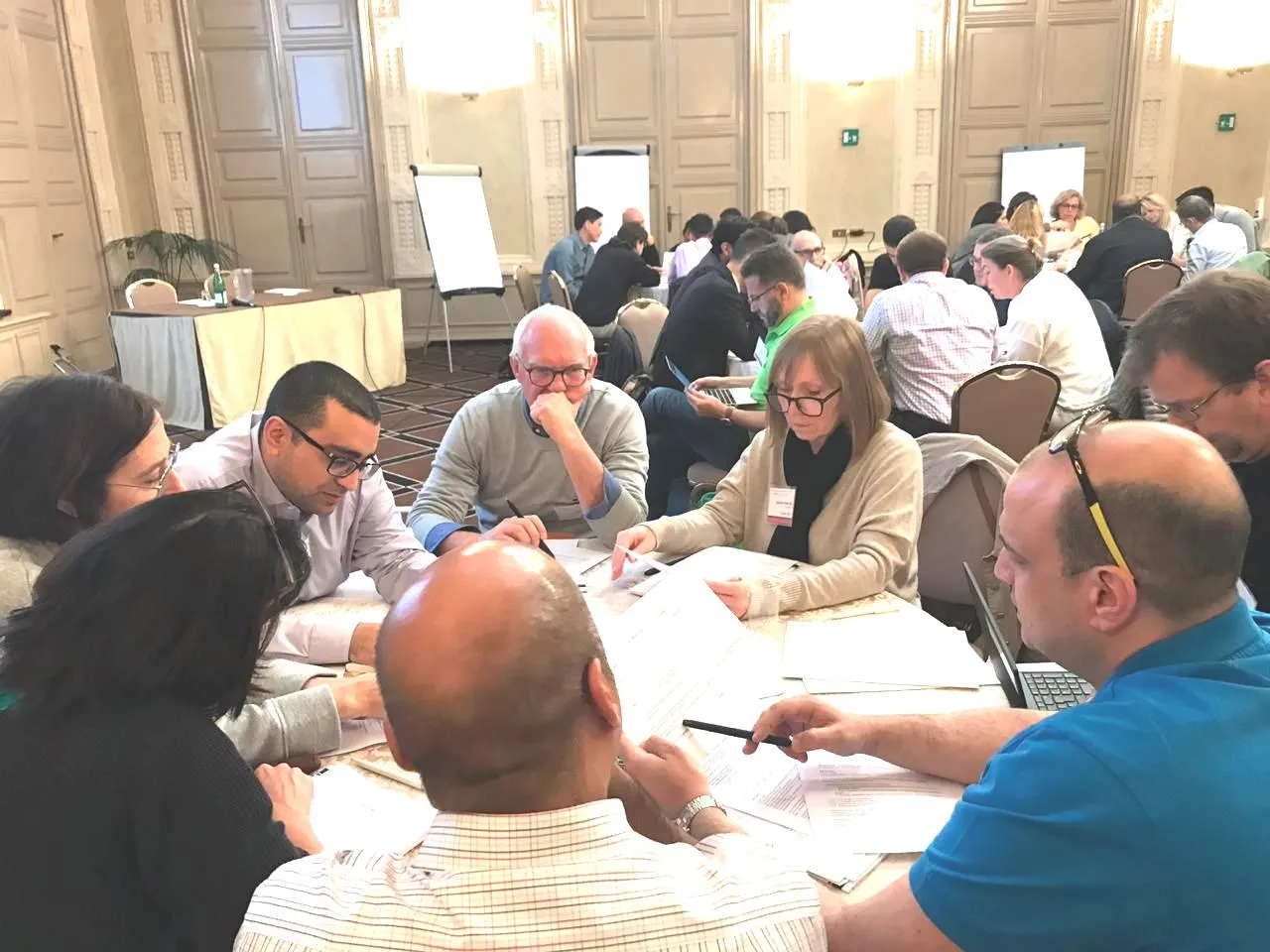 Participants working through cases at an EQuIP workshop