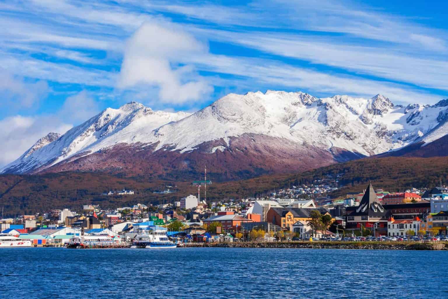 a view of a city and mountains from a distance