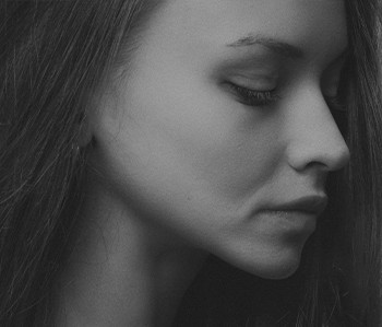 grayscale photography of woman's face